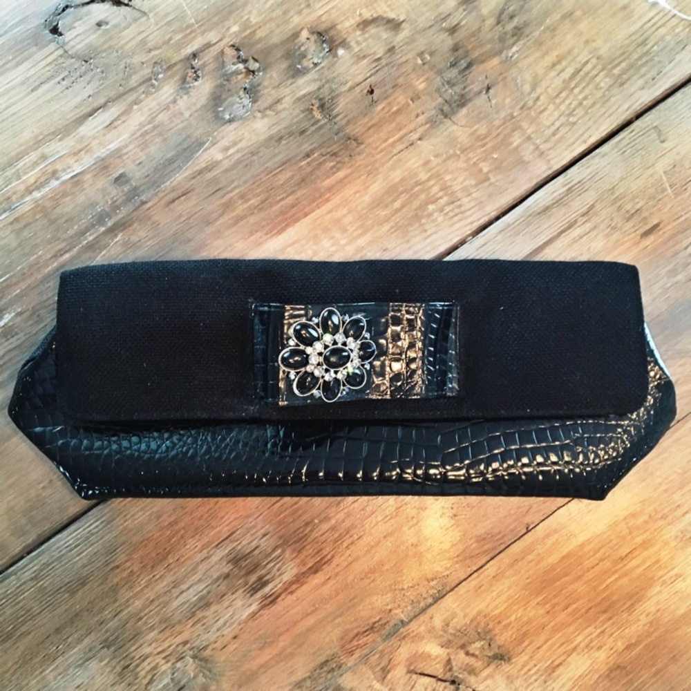 Black boutique clutch with cuff